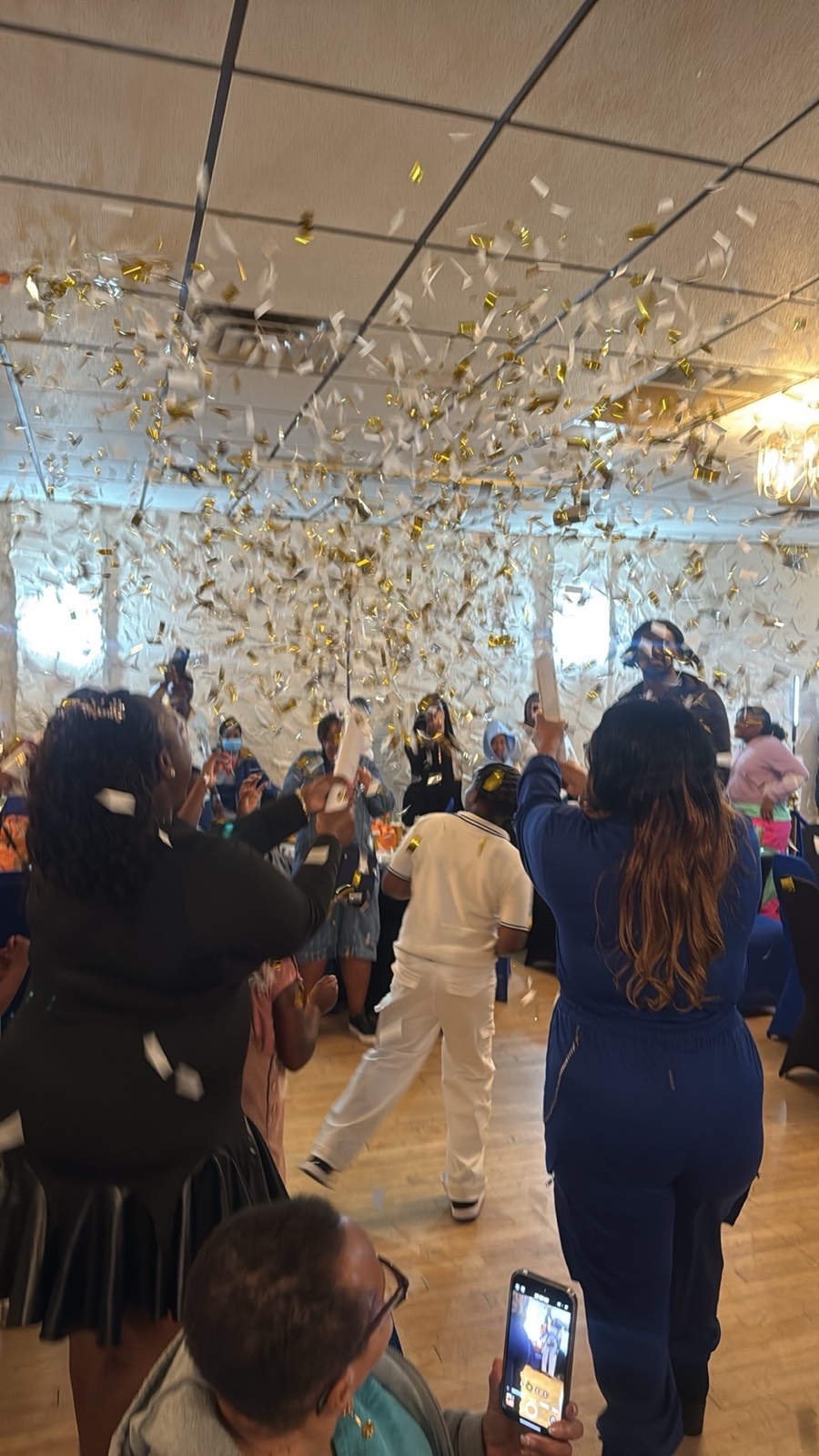 A confetti-filled celebration moment on the dance floor at the sports-themed birthday party.